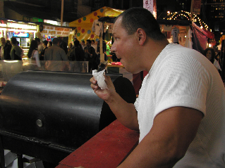 Johnny Salami eating at the San Gennaro feast